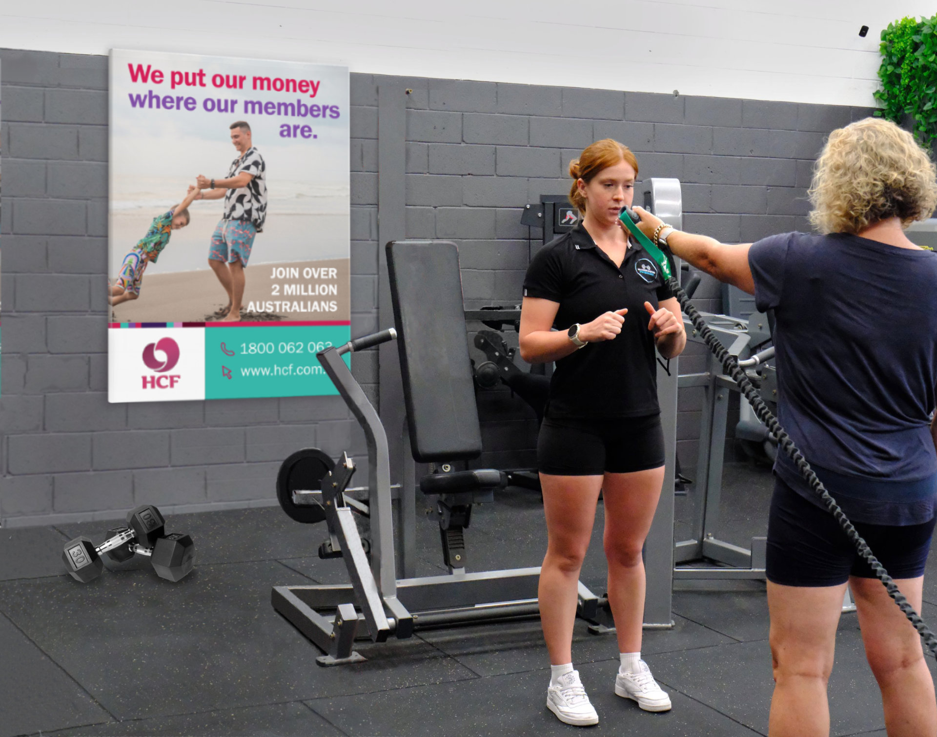 Image of a Gym Instructor and Student working out in a gym
